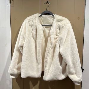 Cream fur jacket w silk lining